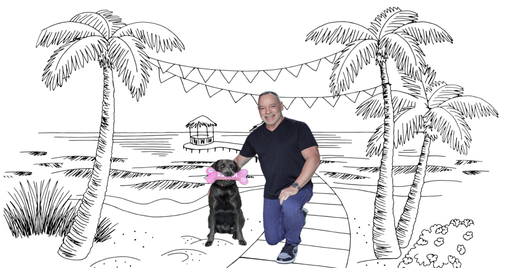 Dan Smyrl at the beach with his dog Ash