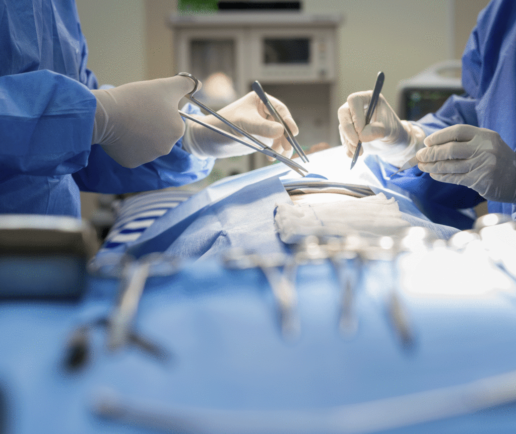 Closeup of surgical tools sitting on top of an operating table