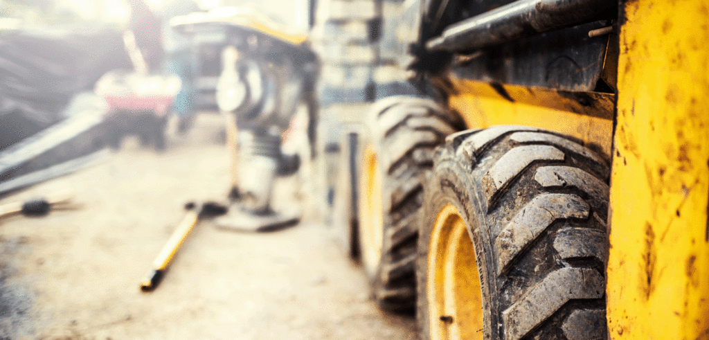 Closeup image of construction vehicles on a job site