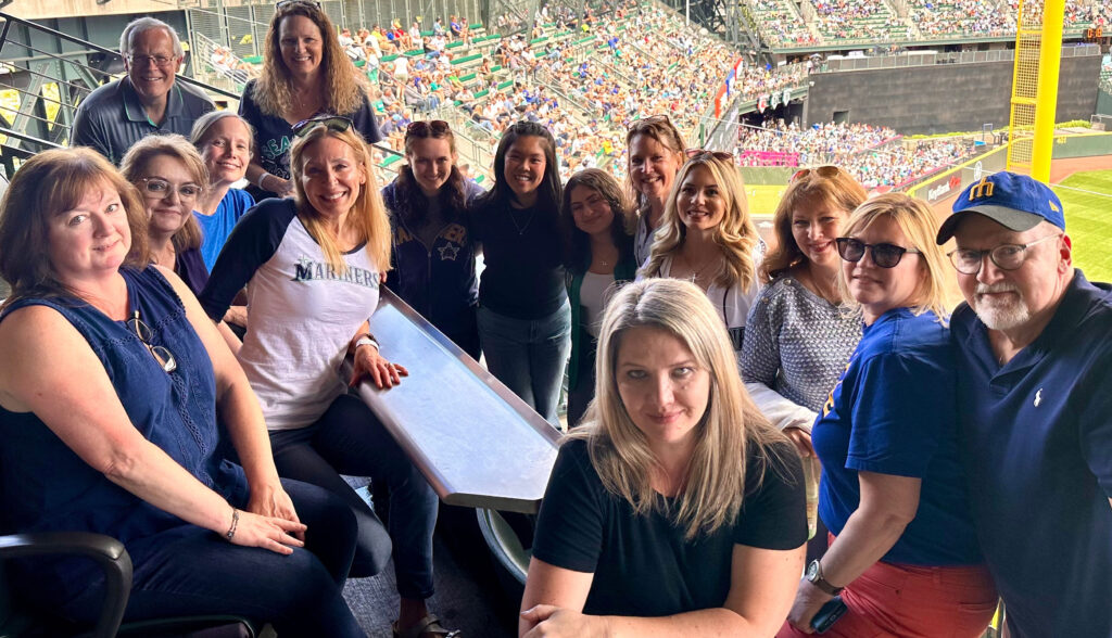 Admiral employees and interns at a Phillies baseball game