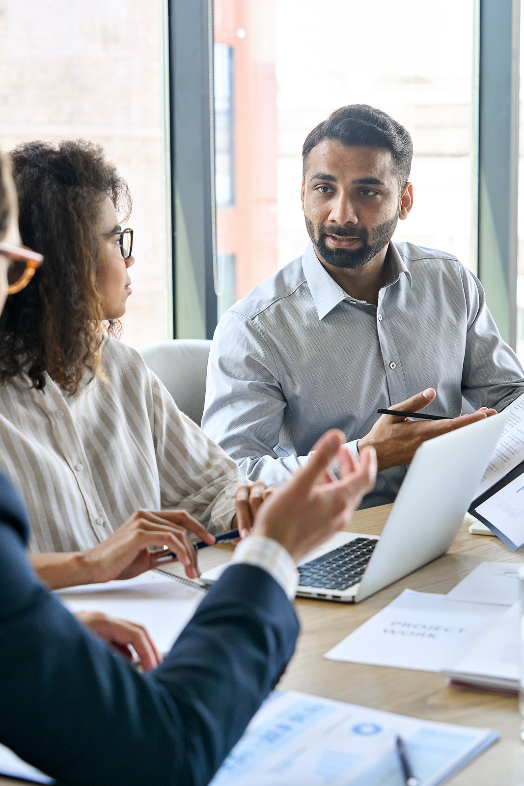Diverse Executive Business Team Group Discuss Project at Boardroom Meeting