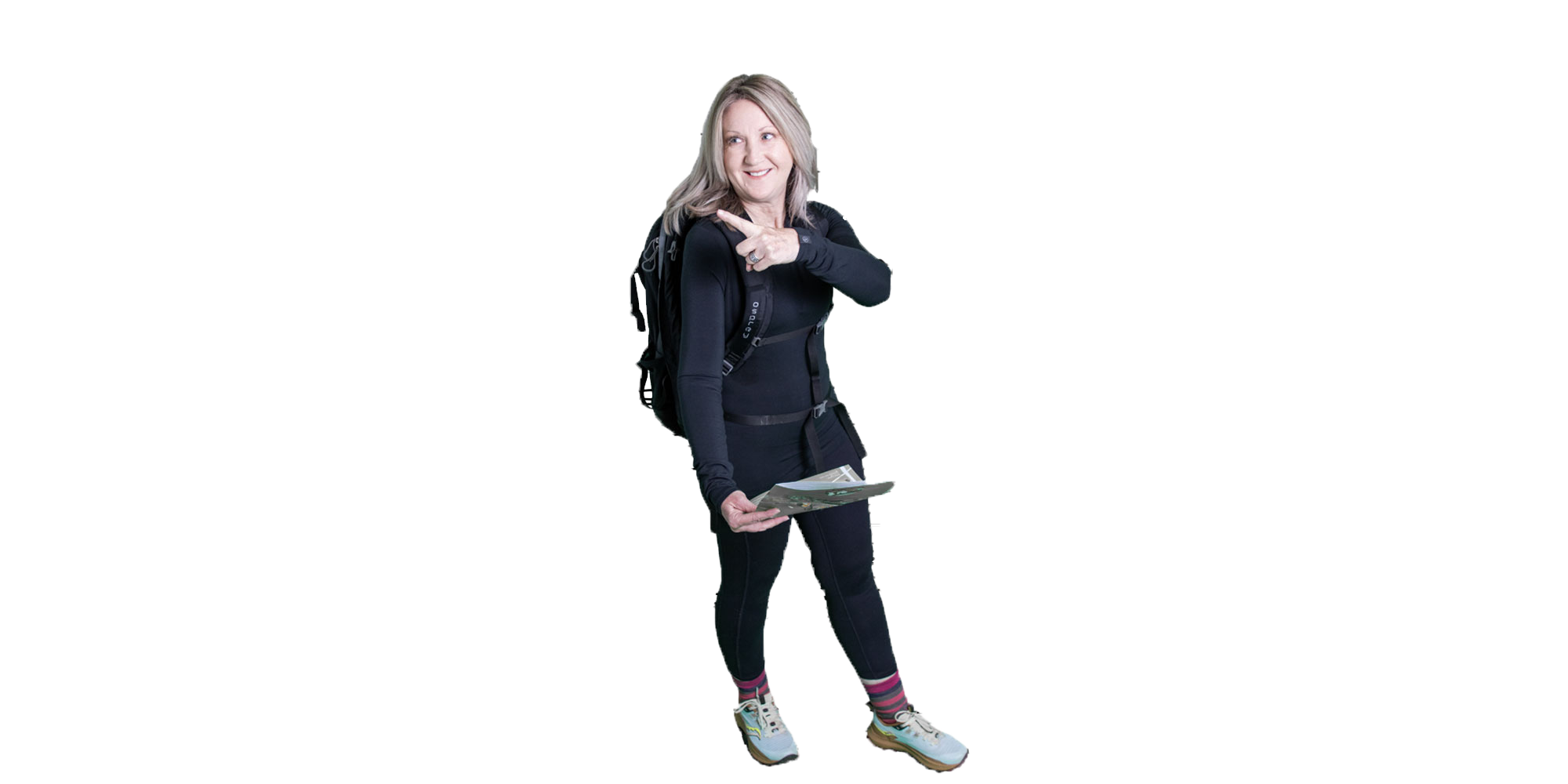 Deidre Haehl hiking with a map