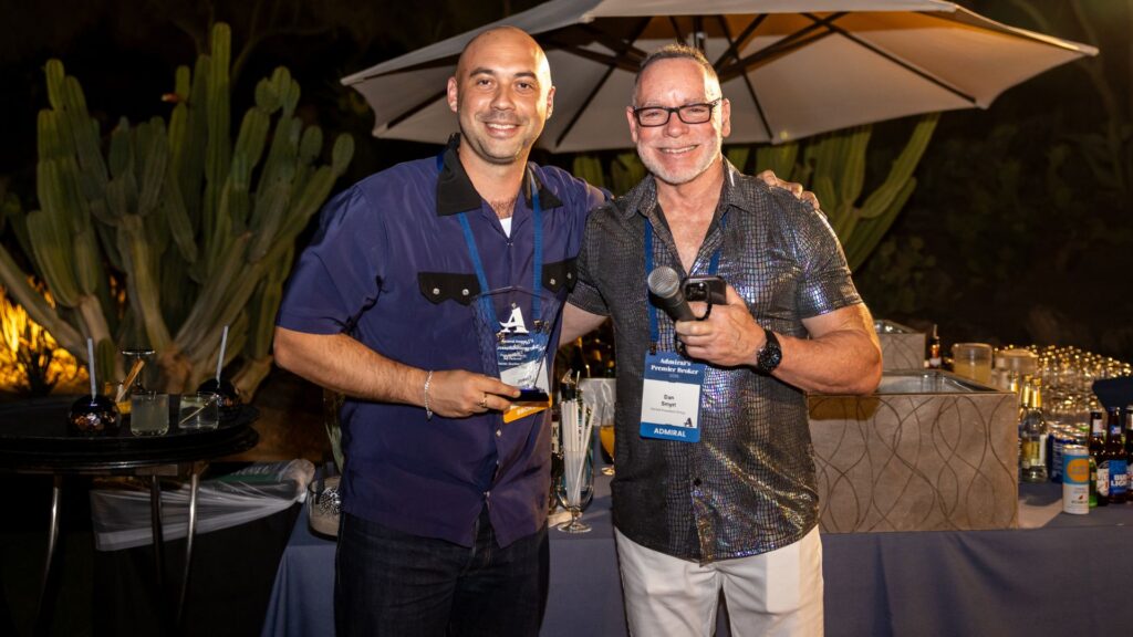 Joe Donovan receiving award from Dan Smyrl at Premier Broker